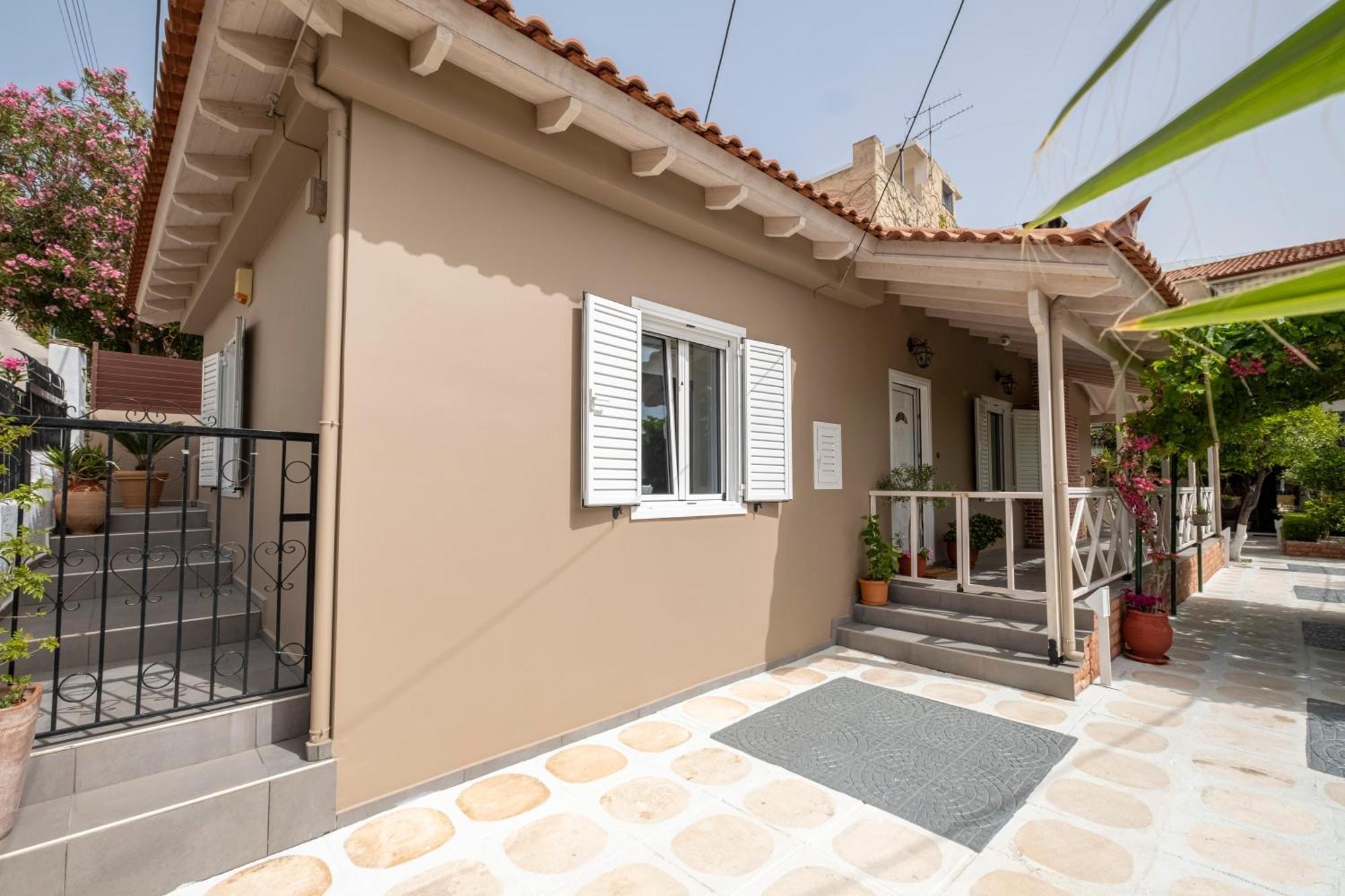 Oasis Home Толо Екстер'єр фото