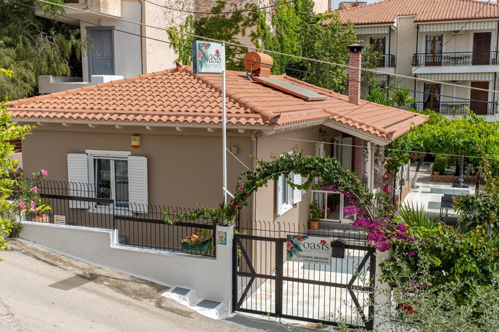 Oasis Home Толо Екстер'єр фото